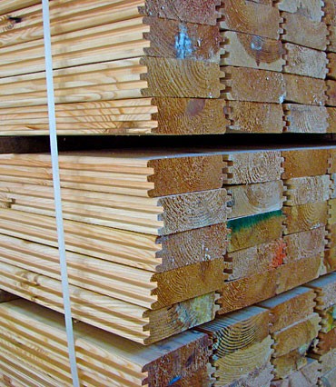 Logs for construction of wooden houses